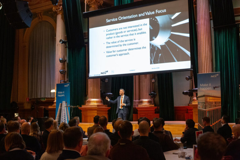 Dr. Paul Viio delivering a B2B value sales keynote at NCC Sweden